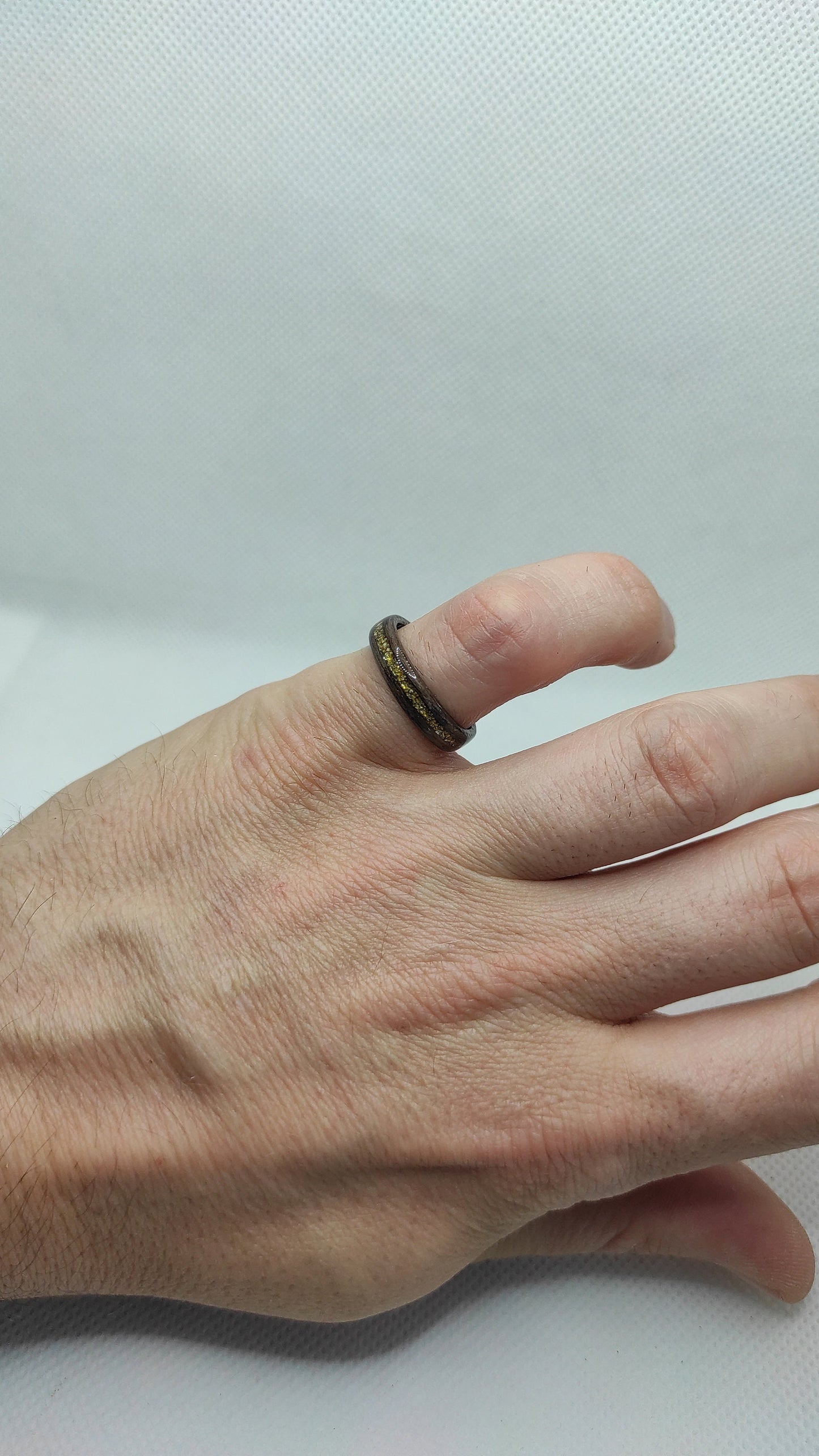 Minimalist eco-friendly walnut ring with gold accents