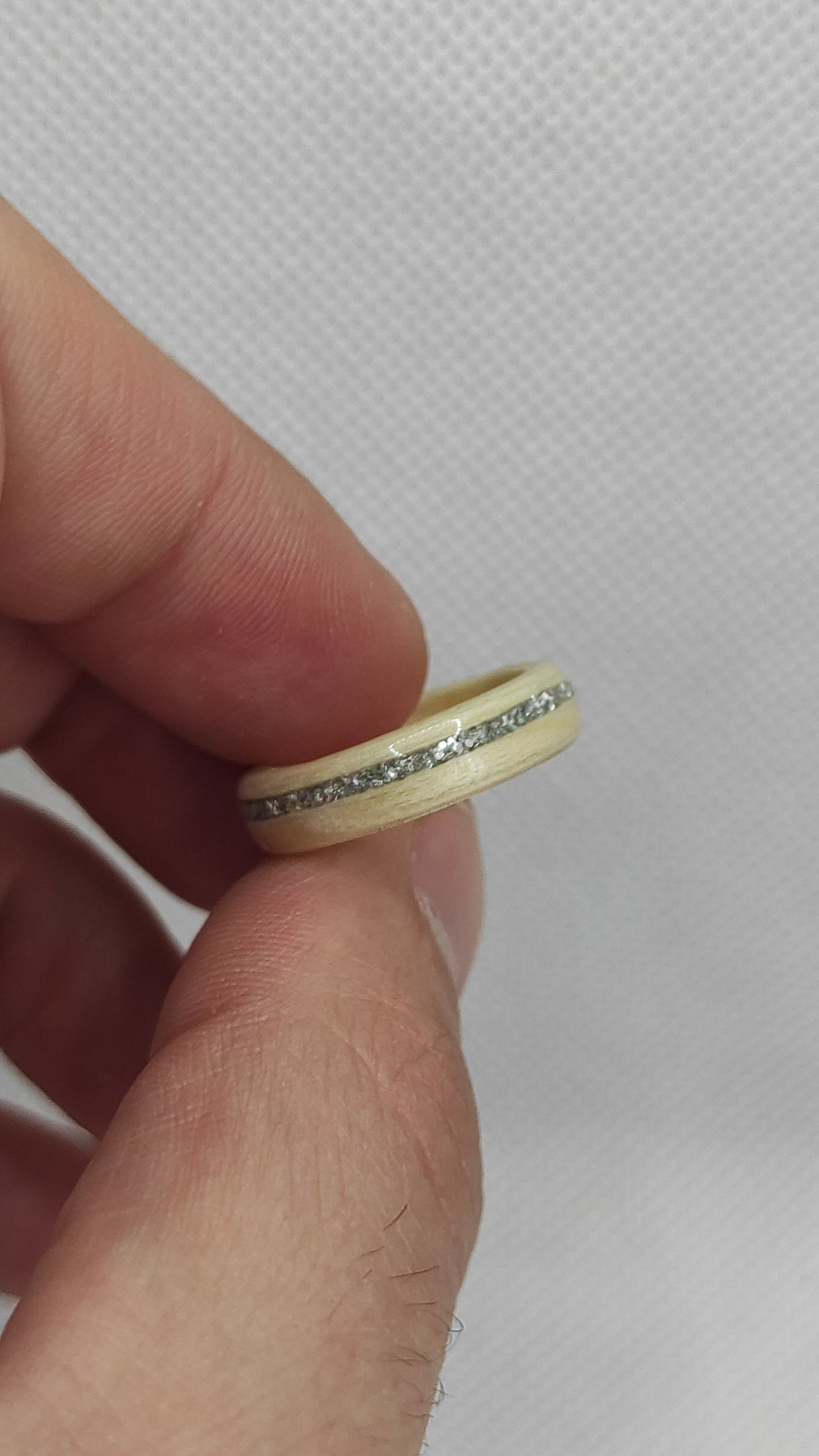 Nature-inspired maple wood band with silver detail