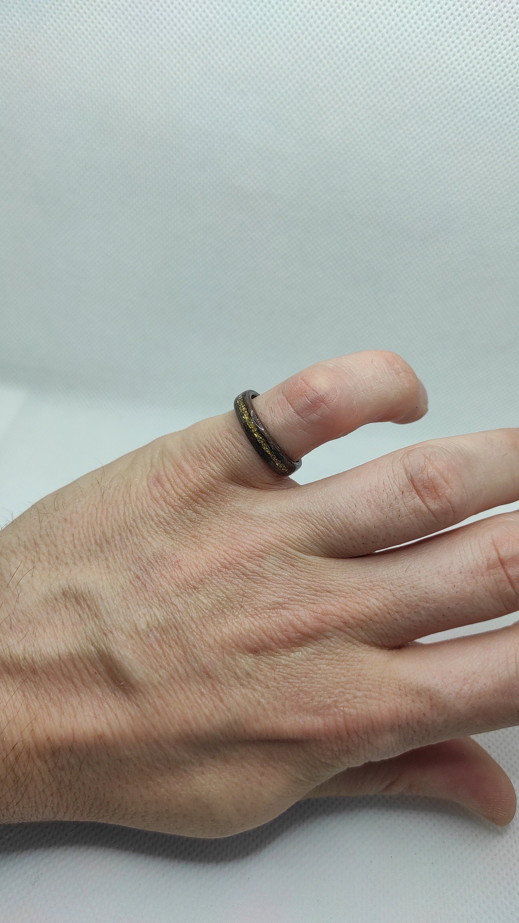 Minimalist eco-friendly walnut ring with gold accents