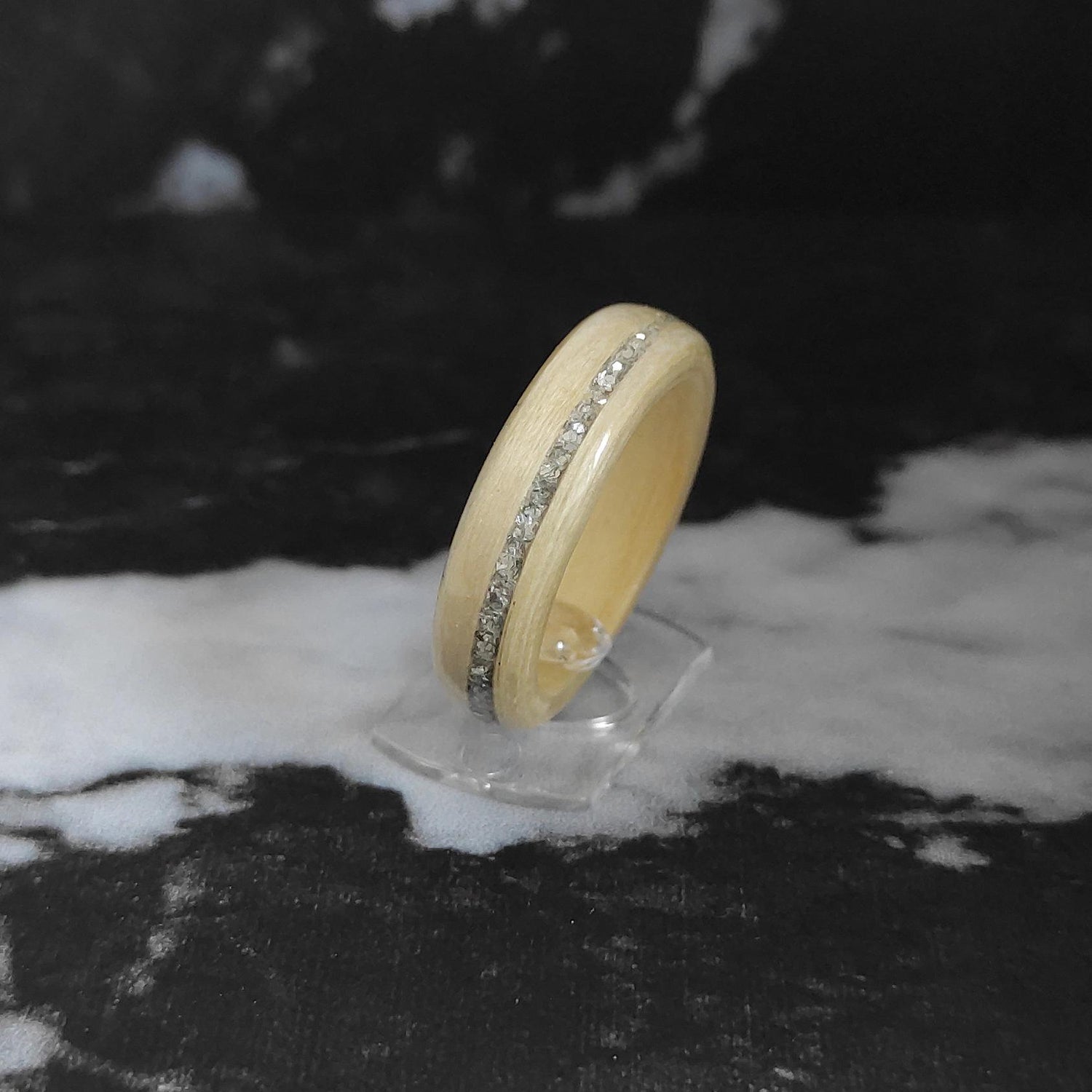 Handmade maple wood ring with silver inlay close-up