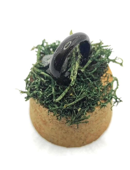Black oak veneer ring with silver thread inlay, sleek bentwood design