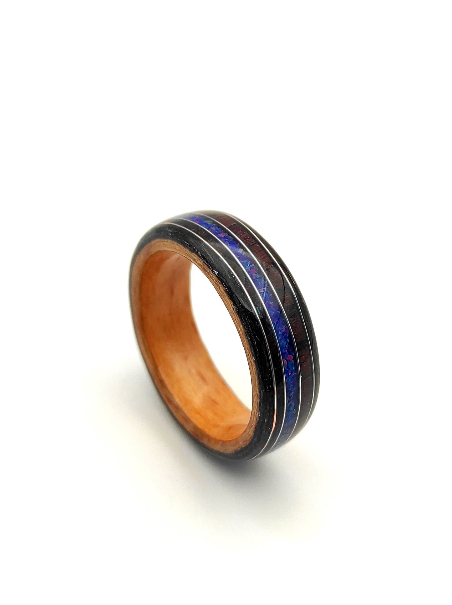 Handmade triple veneer wood ring with purple rosewood and blue opal inlay
