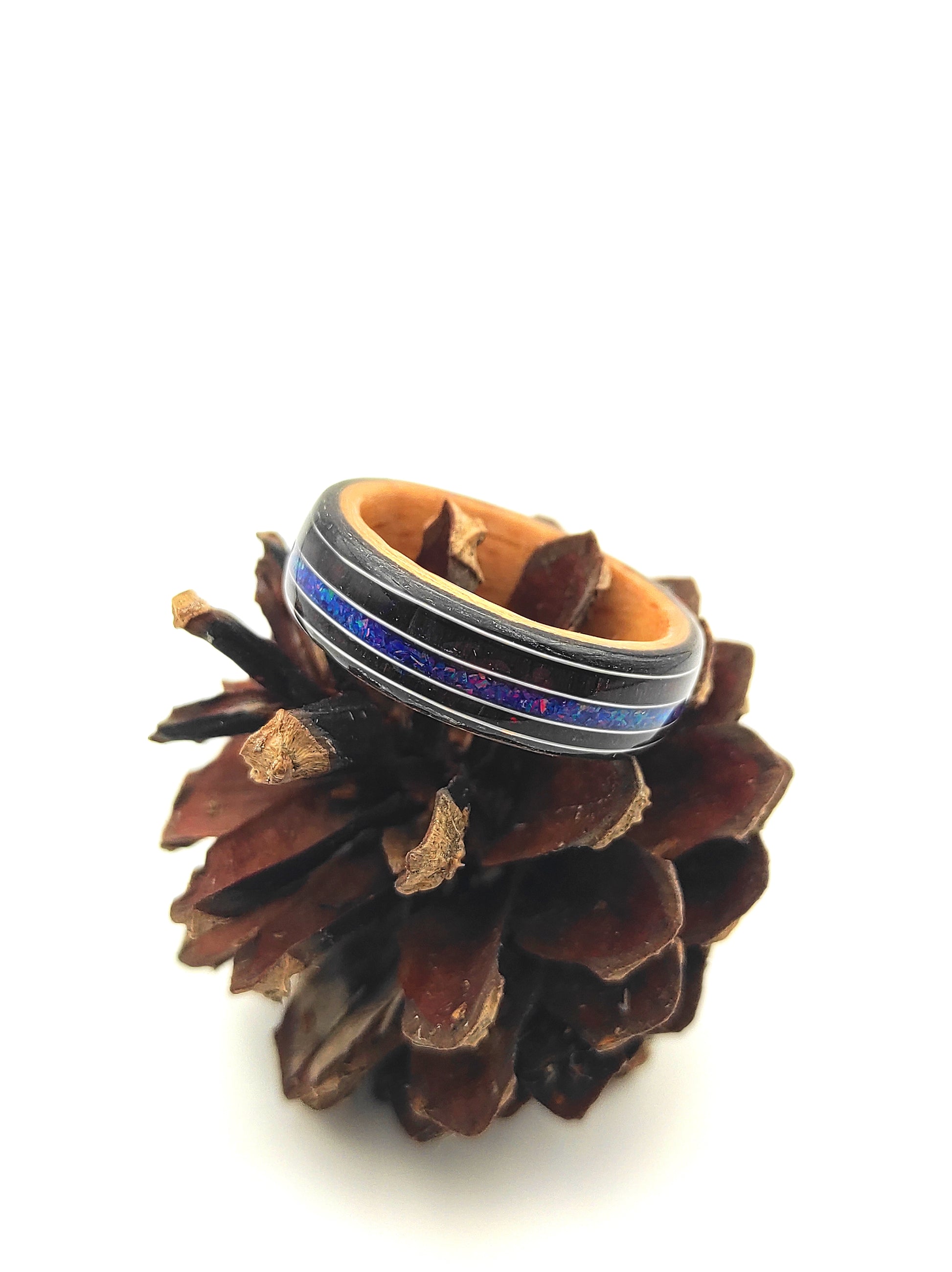 Eco-friendly wood ring made with beech, black oak, and rosewood veneers