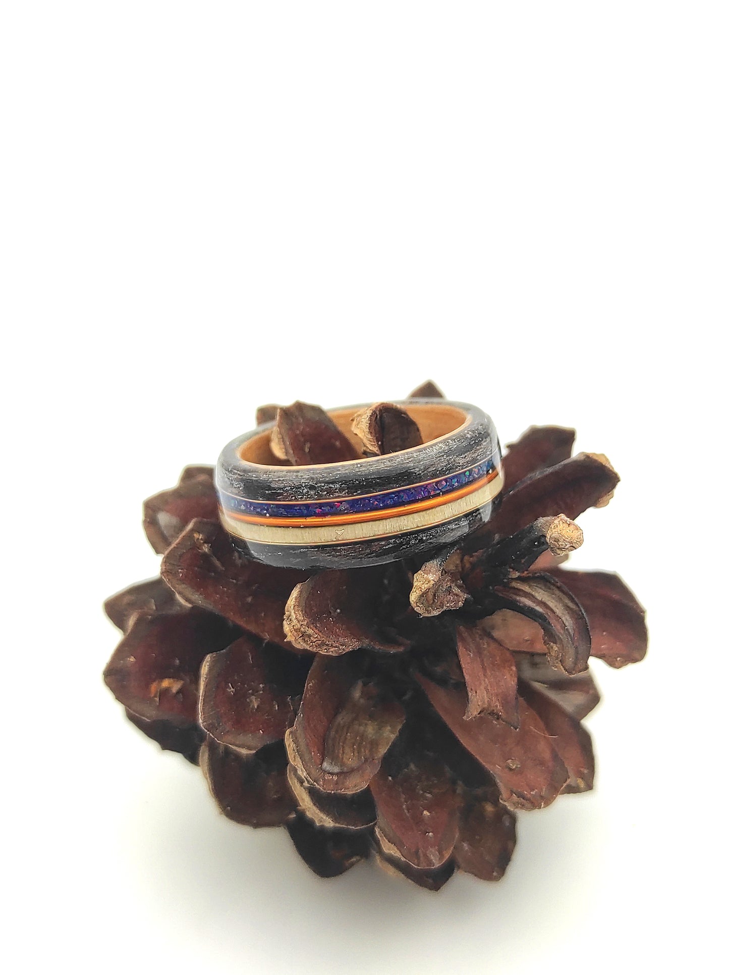 Handmade wooden ring with black oak, beech wood core, maple accent, blue crushed opal and copper inlay